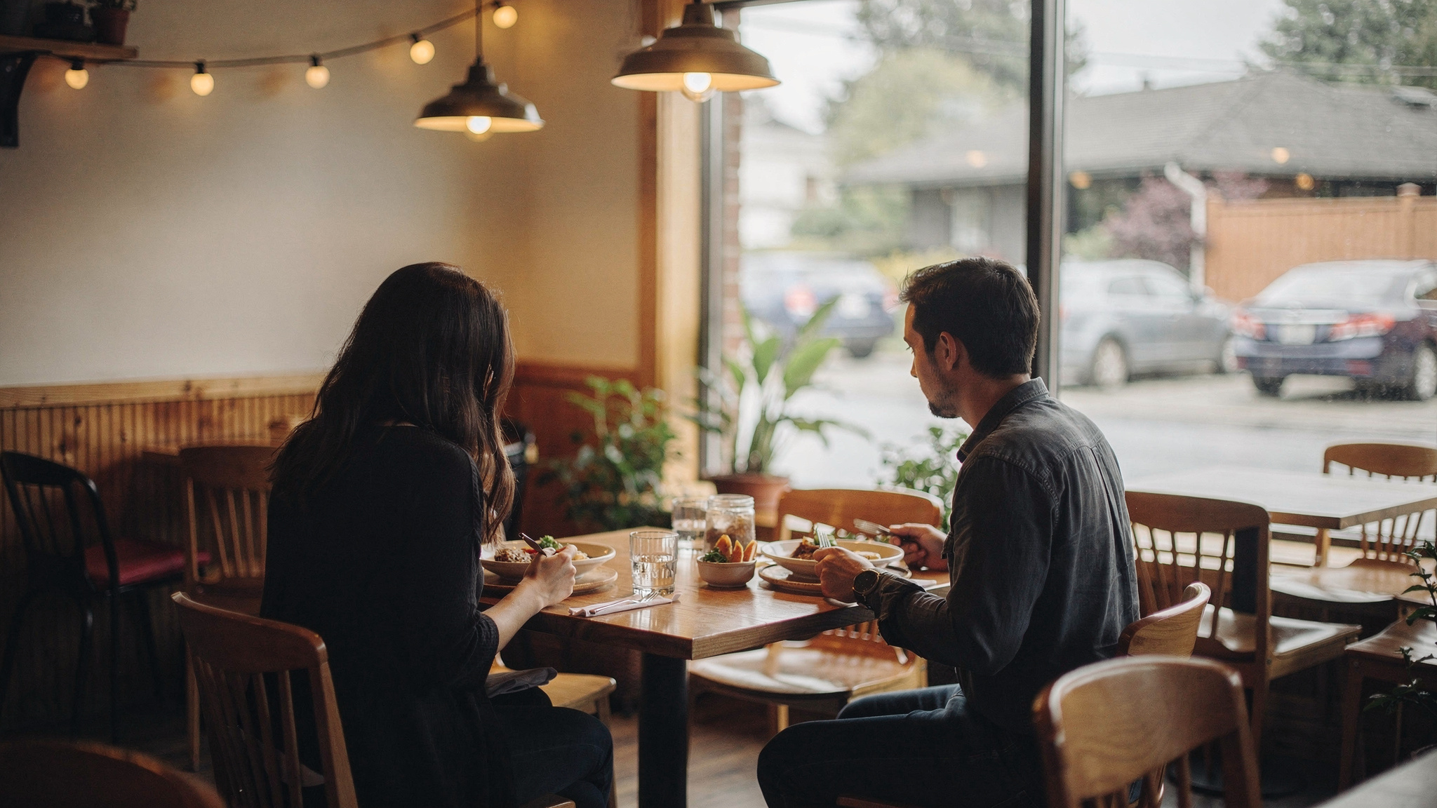 burnaby bc best hidden eateries v2 Burnaby, BC: Best Hidden Eateries Two diners sharing a meal at a cozy Burnaby neighbourhood restaurant